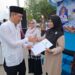 Kunjungi Bazaar HUT ke-26, Sekda Deden Serahkan NIB dan Sertifikat Halal